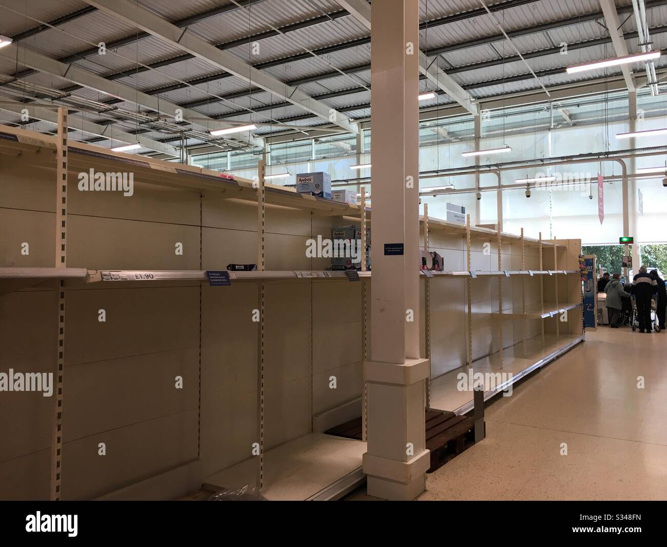 Empty shelves due to panic buying during the Coronavirus outbreak, March 2020 - Smartphone Captured Stock Image