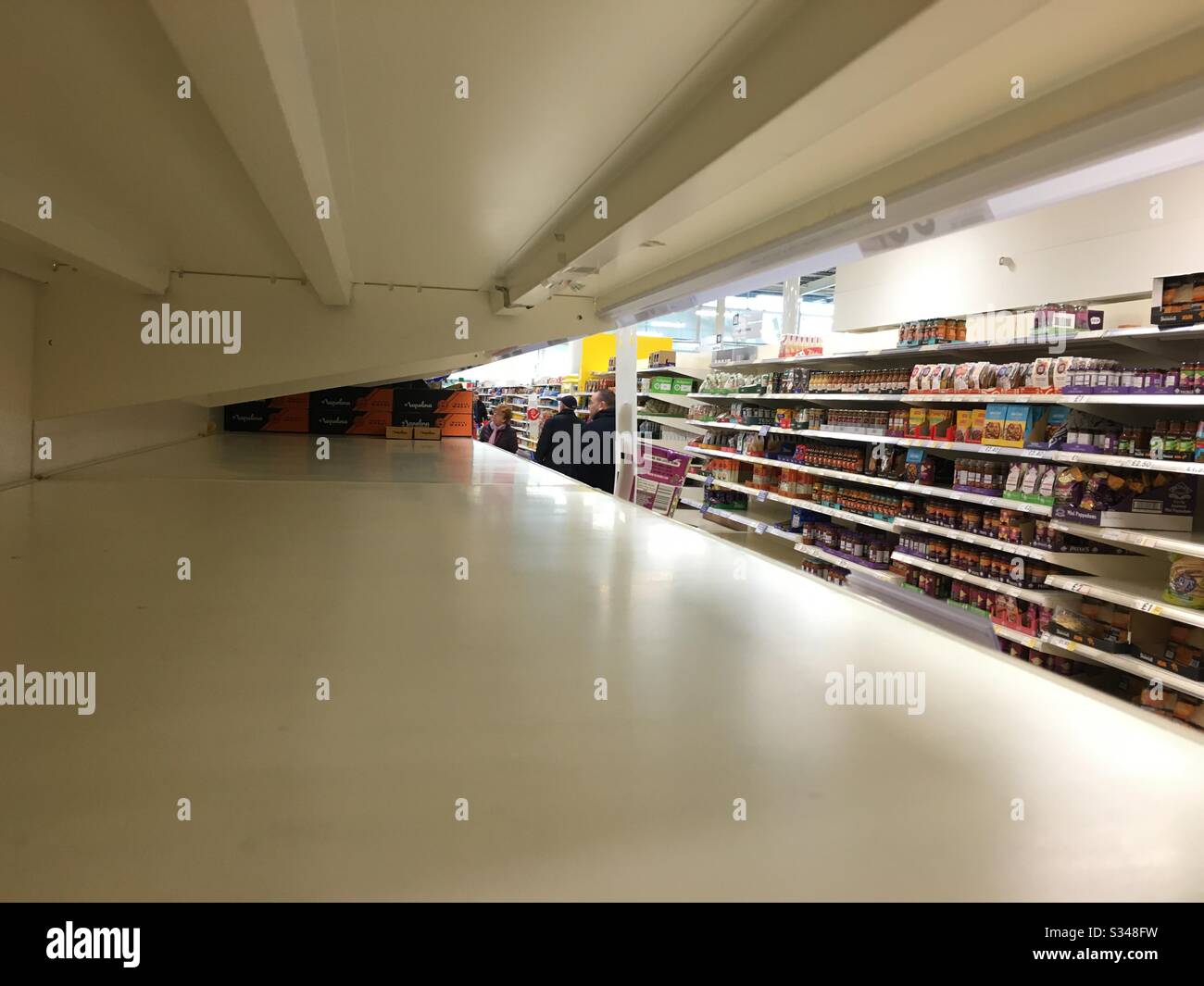 Empty shelves due to panic buying during the Coronavirus outbreak, March 2020 - Smartphone Captured Stock Image