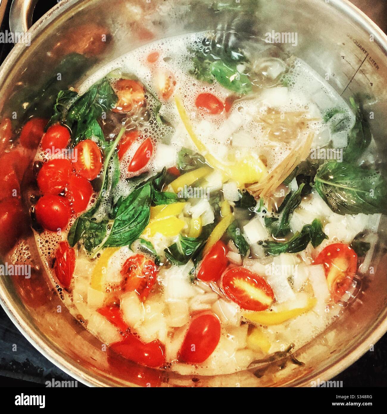 Pasta sauce cooking in the stainless steel pot Stock Photo Alamy