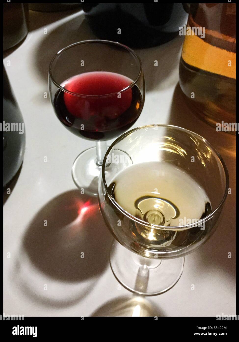 A glass of white Viognier wine, with a light red Syrah rosé, Catalonia, Spain. - Smartphone Captured Stock Image