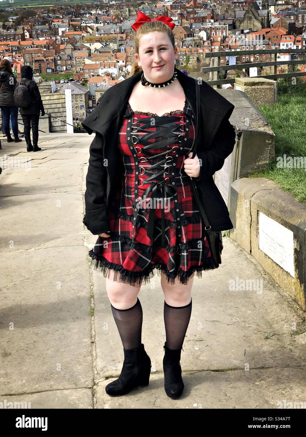 Person in a creative costume during a cosplay event. Whitby Goth Weekend.  Caucasian goth girl portrait - Smartphone Captured Stock Image