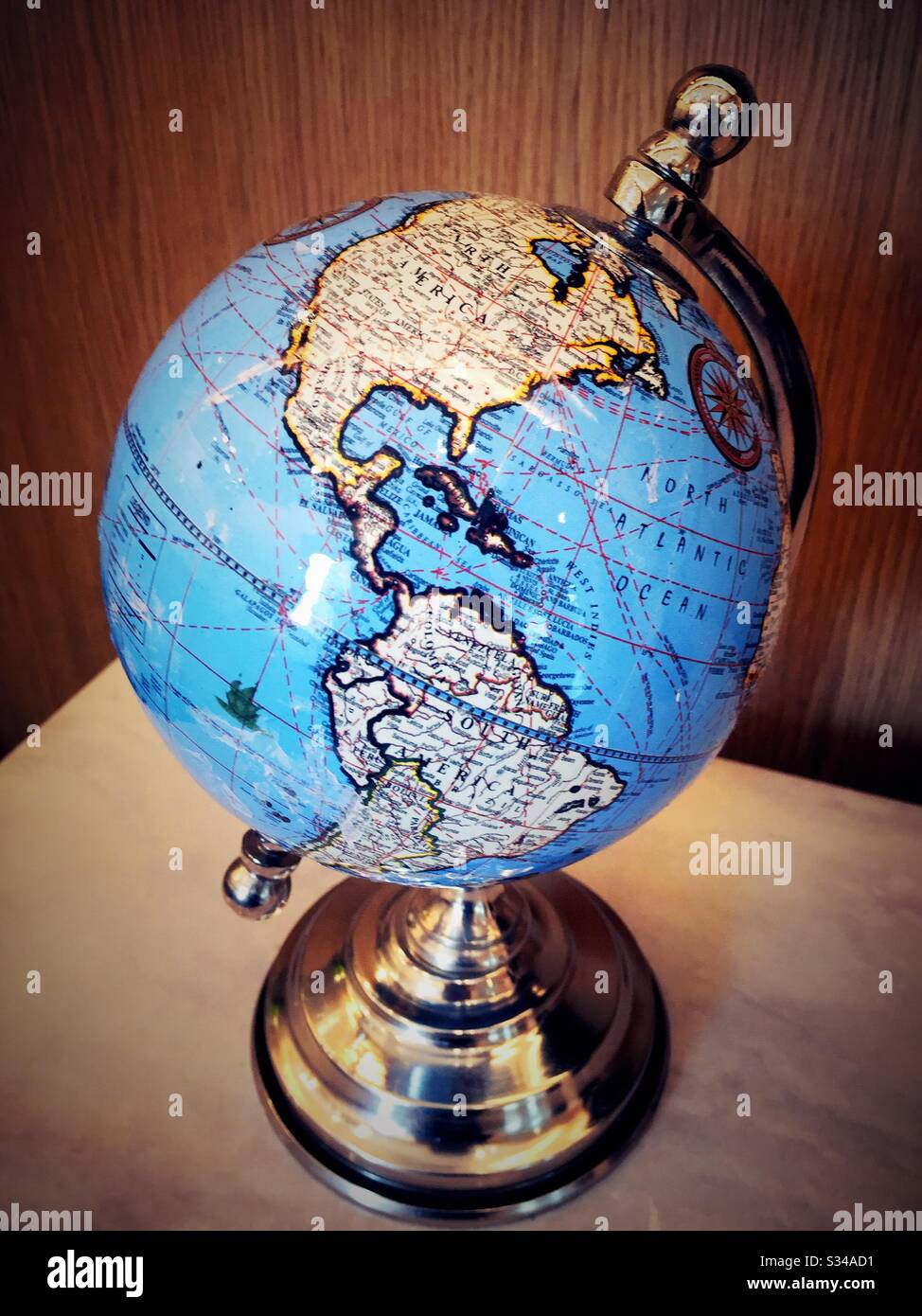 Close up of a stylized globe on a desktop Stock Photo