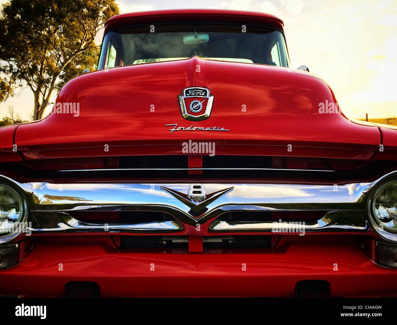 Front grillle detail of a restored 1956 second generation V8 Ford F-100 pickup truck with Ford-O-Matic transmission Stock Photo