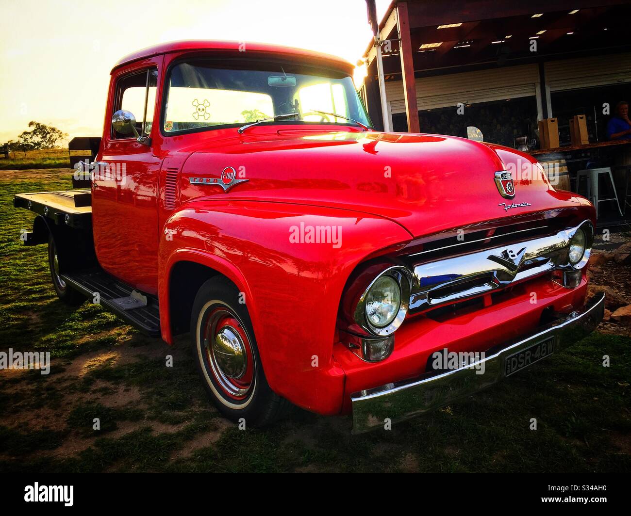 Three-quarter front view of a restored 1956 second generation V8 Ford F-100 pickup truck with Ford-O-Matic transmission - Smartphone Captured Stock Image