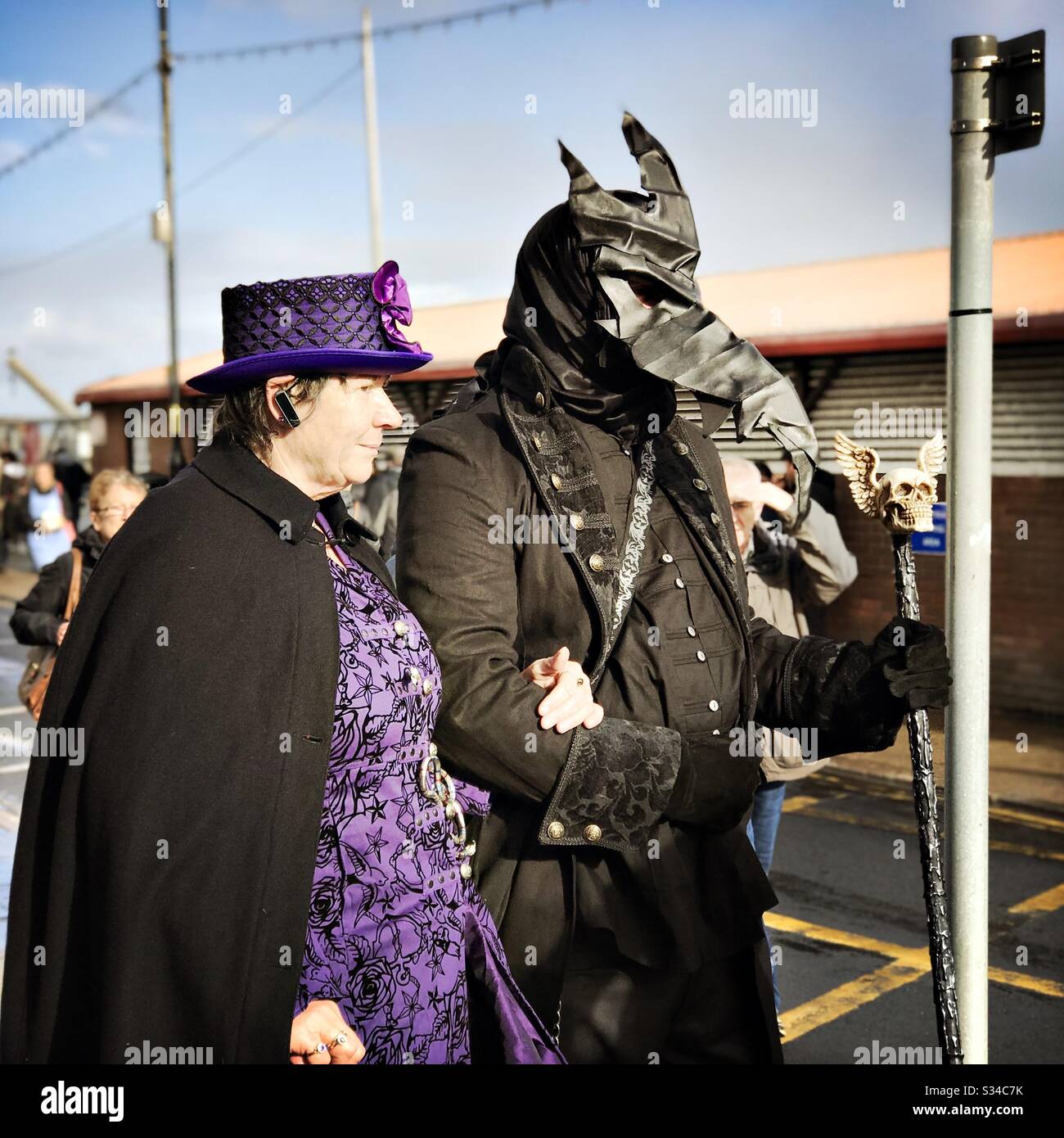 People in creative costumes during a cosplay event. Whitby Goth Weekend.  Gothic couple, man wears pointed plague doctor mask Stock Photo - Alamy