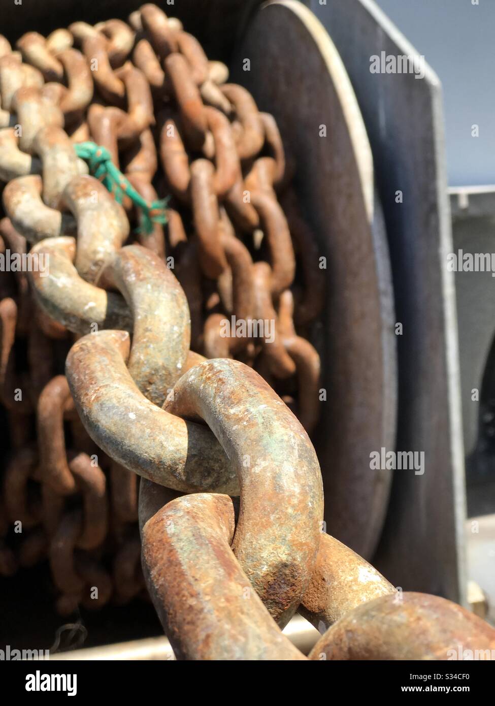 Chain on a boat winch Stock Photo Alamy