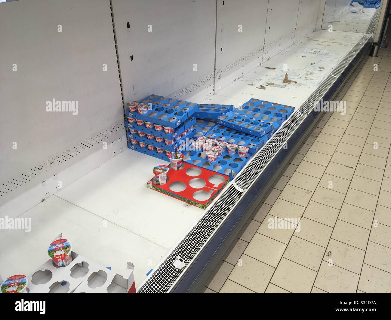 Almost empty shelf shelves in supermarket, Sopron, Hungary Stock Photo