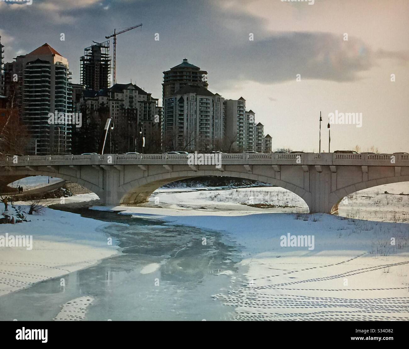Downtown Calgary, 10th street bridge, Louise bridge, Bow River, Calgary, Alberta, Canada , pedestrian foot bridge - Smartphone Captured Stock Image