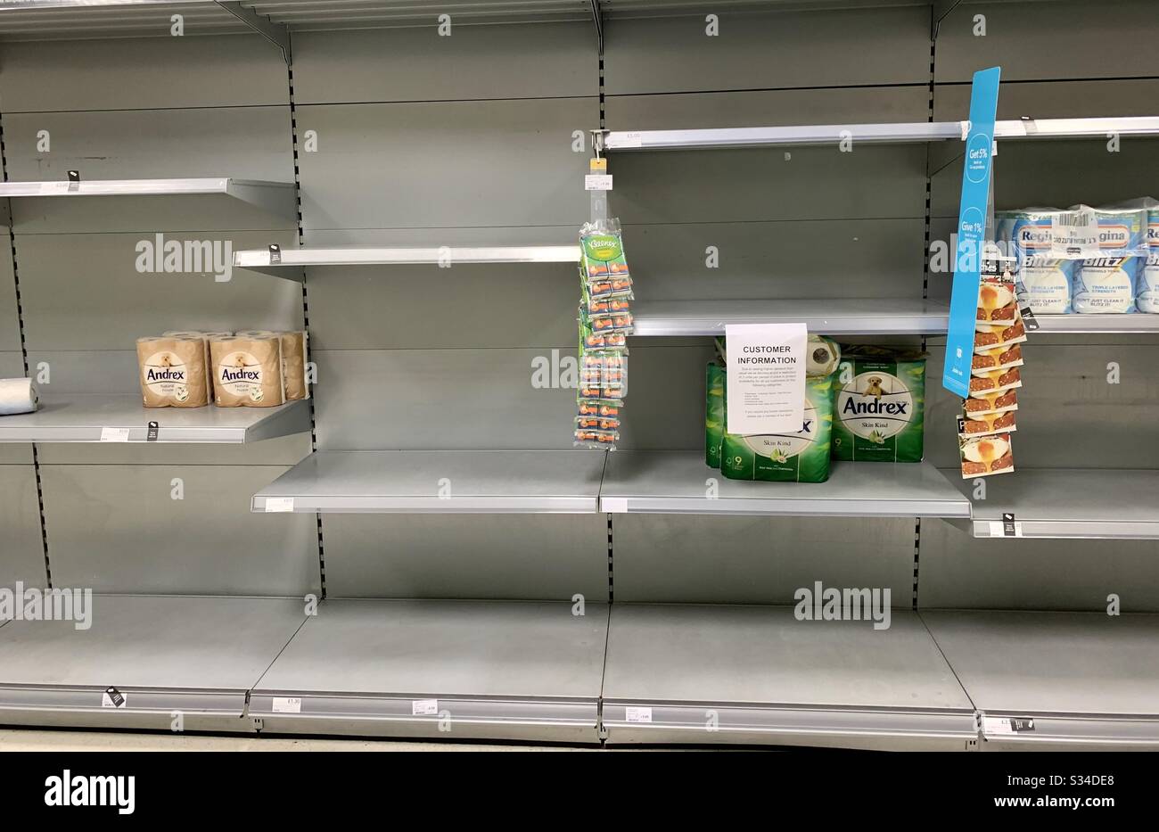 Empty supermarket shelves cleared of toilet roll in Mablethorpe in Lincolnshire caused by coronavirus Covid19 panic buying Stock Photo