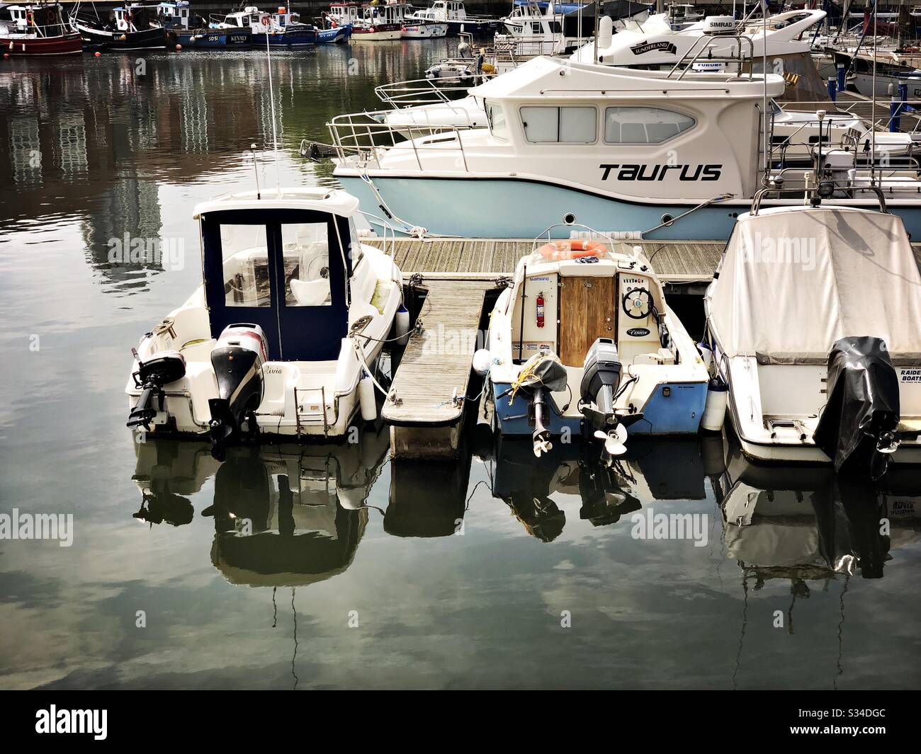 Fishing boats moored at a small marina. Roker Marina, Sunderland, North