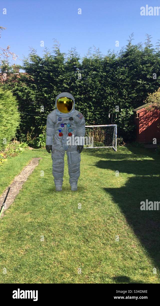 Spaceman in garden Stock Photo