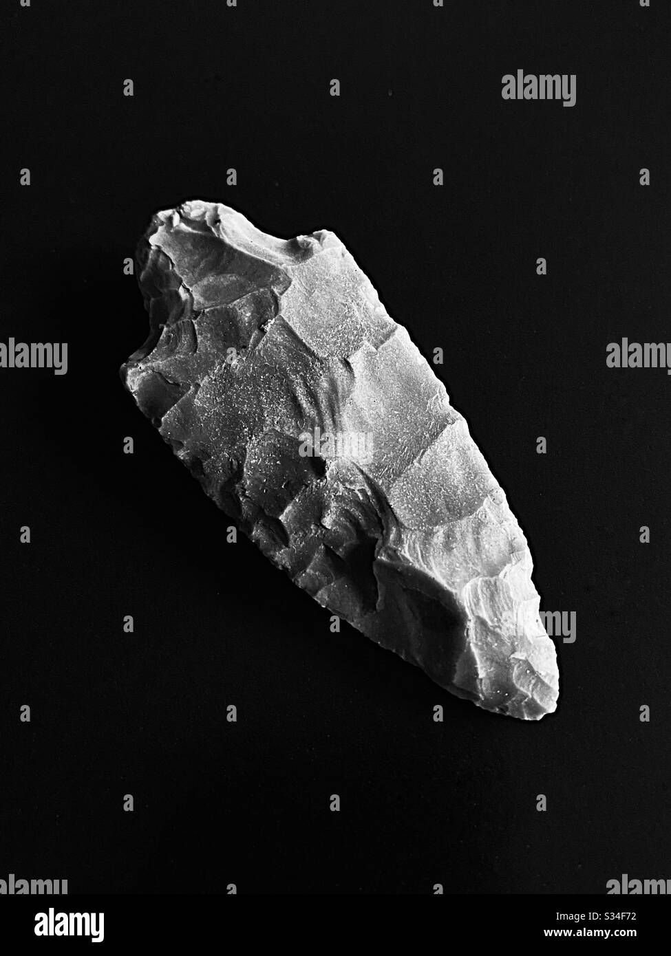 Native American arrowhead in black and white - Smartphone Captured Stock Image