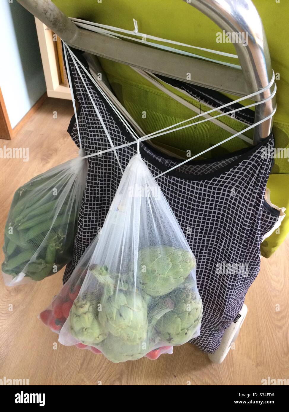 Full shopping cart as a preventive measure during the corona virus pandemic. - Smartphone Captured Stock Image