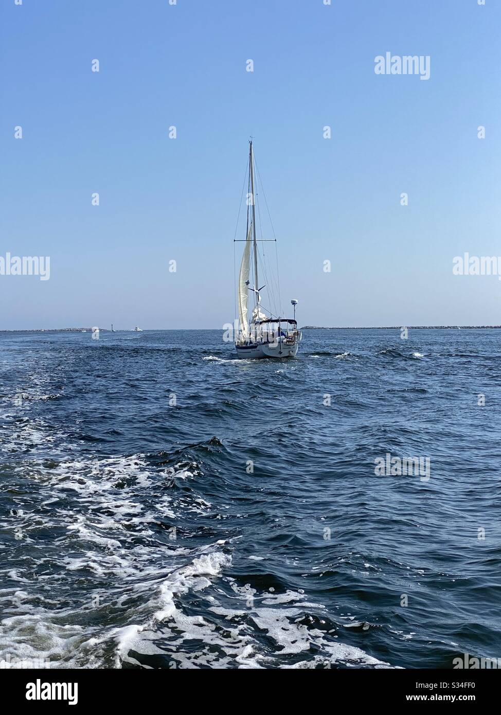 Sailboat on the blue Gulf of Mexico water - Smartphone Captured Stock Image