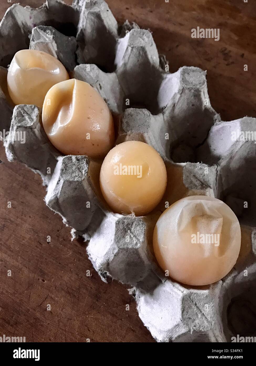 Eggs without shells. Laid prematurely by chickens that are shocked or grabbed by surprise. It also happens when chickens lack calcium. Egg white and yolk remains to have the same texture and flavor. Stock Photo