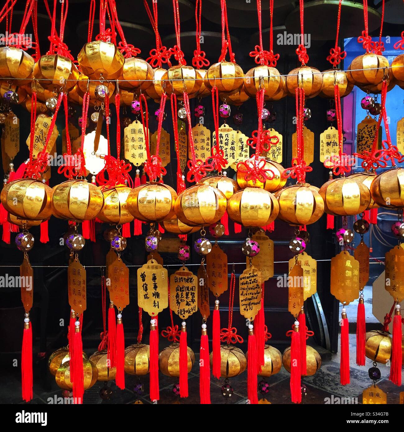 Written prayer requests to the gods in the Tin Hau Temple in Yau Ma Tei, Kowloon, Hong Kong - Smartphone Captured Stock Image