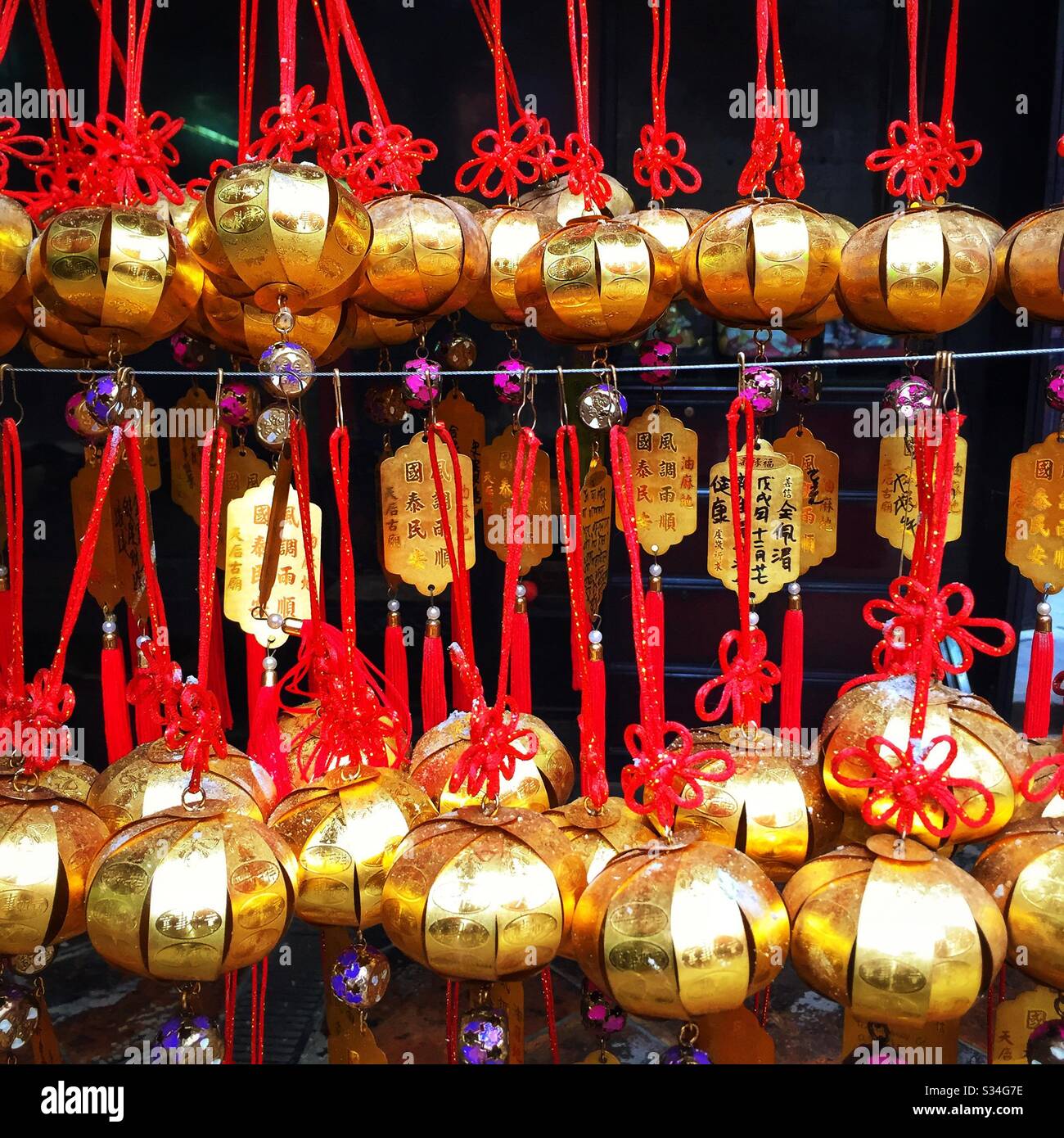Written prayer requests to the gods in the Tin Hau Temple in Yau Ma Tei, Kowloon, Hong Kong - Smartphone Captured Stock Image