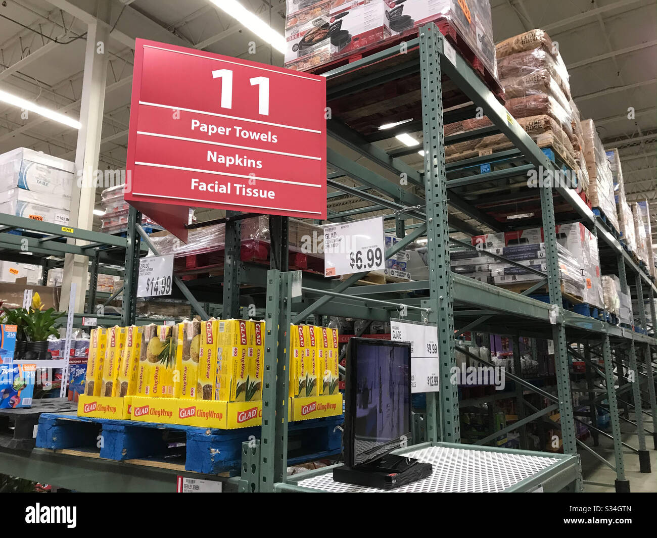 Paper towels and tissues stocks are depleted in wholesale supermarket aisle during coronavirus crisis in New Jersey USA - Smartphone Captured Stock Image