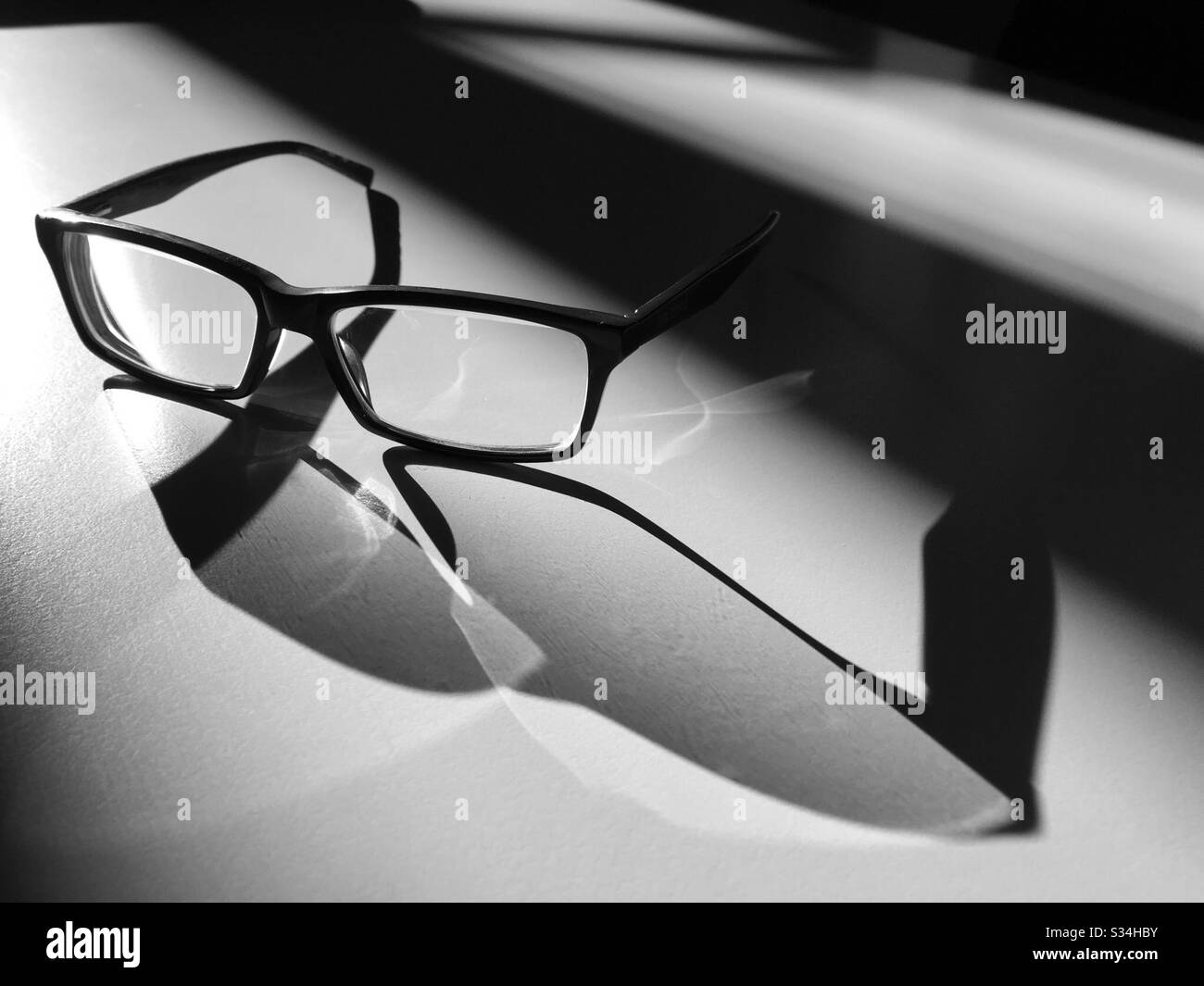 Glasses in the Light and Shadow - Smartphone Captured Stock Image
