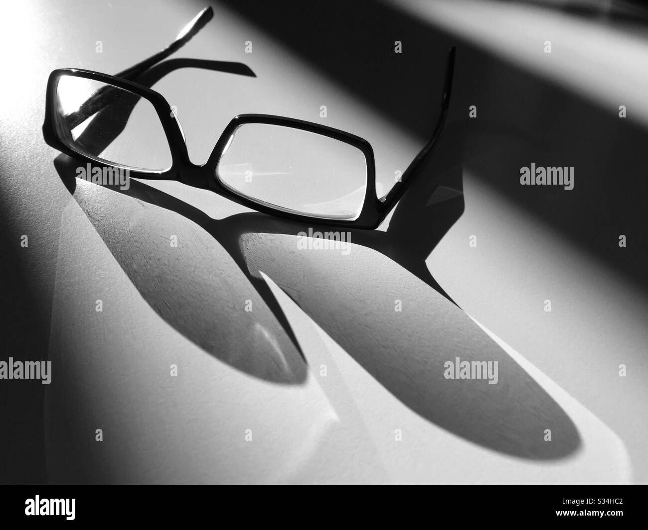 Glasses in the Light and Shadow - Smartphone Captured Stock Image
