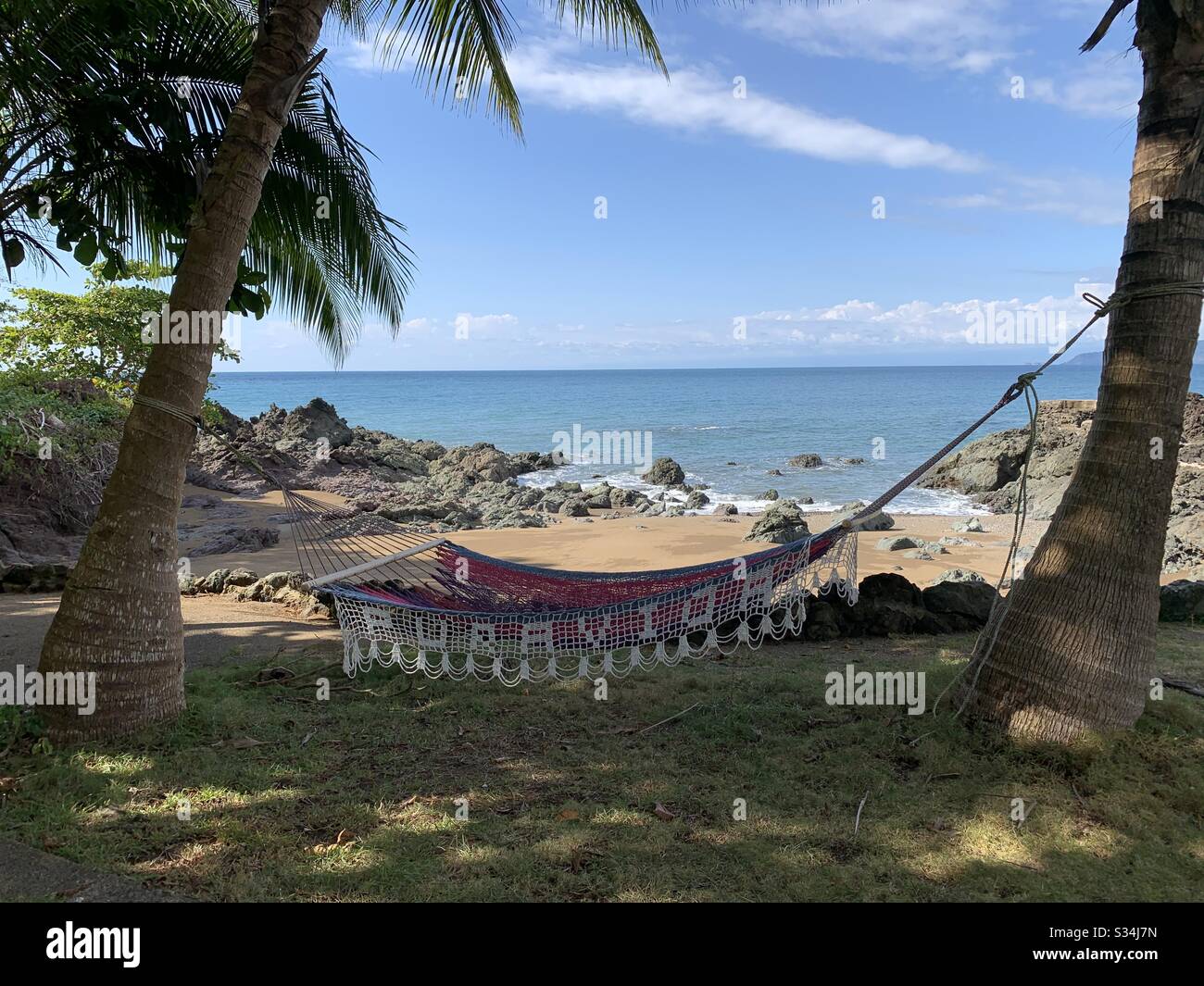 Hammock on a remote Costa Rican beach Stock Photo