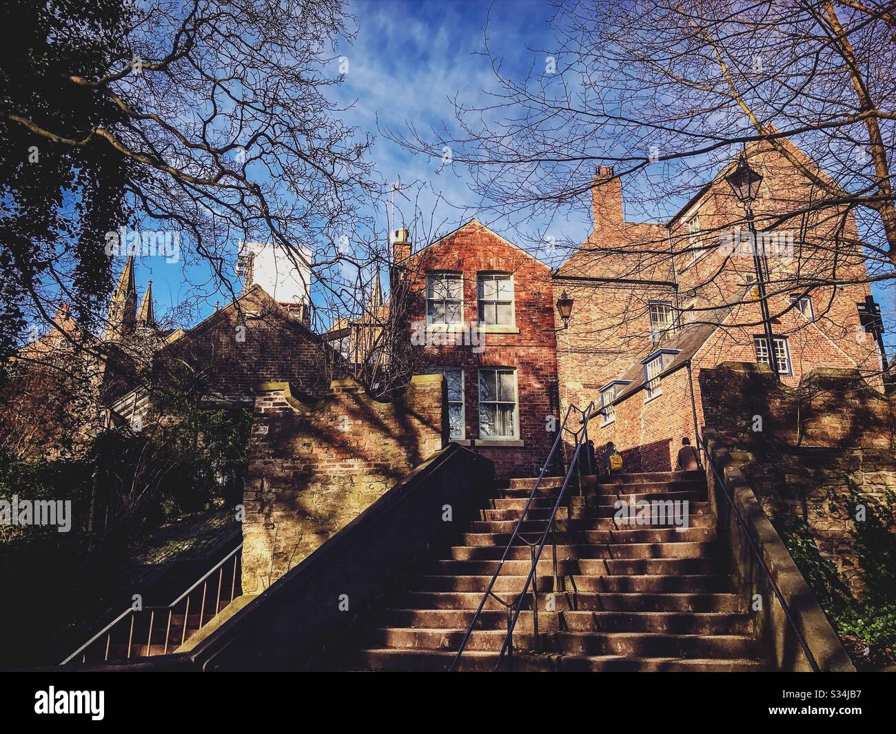Architecture of Durham City, North East England. Red brick buildings of Bow Lane, seen from Kingsgate Bridge - Smartphone Captured Stock Image