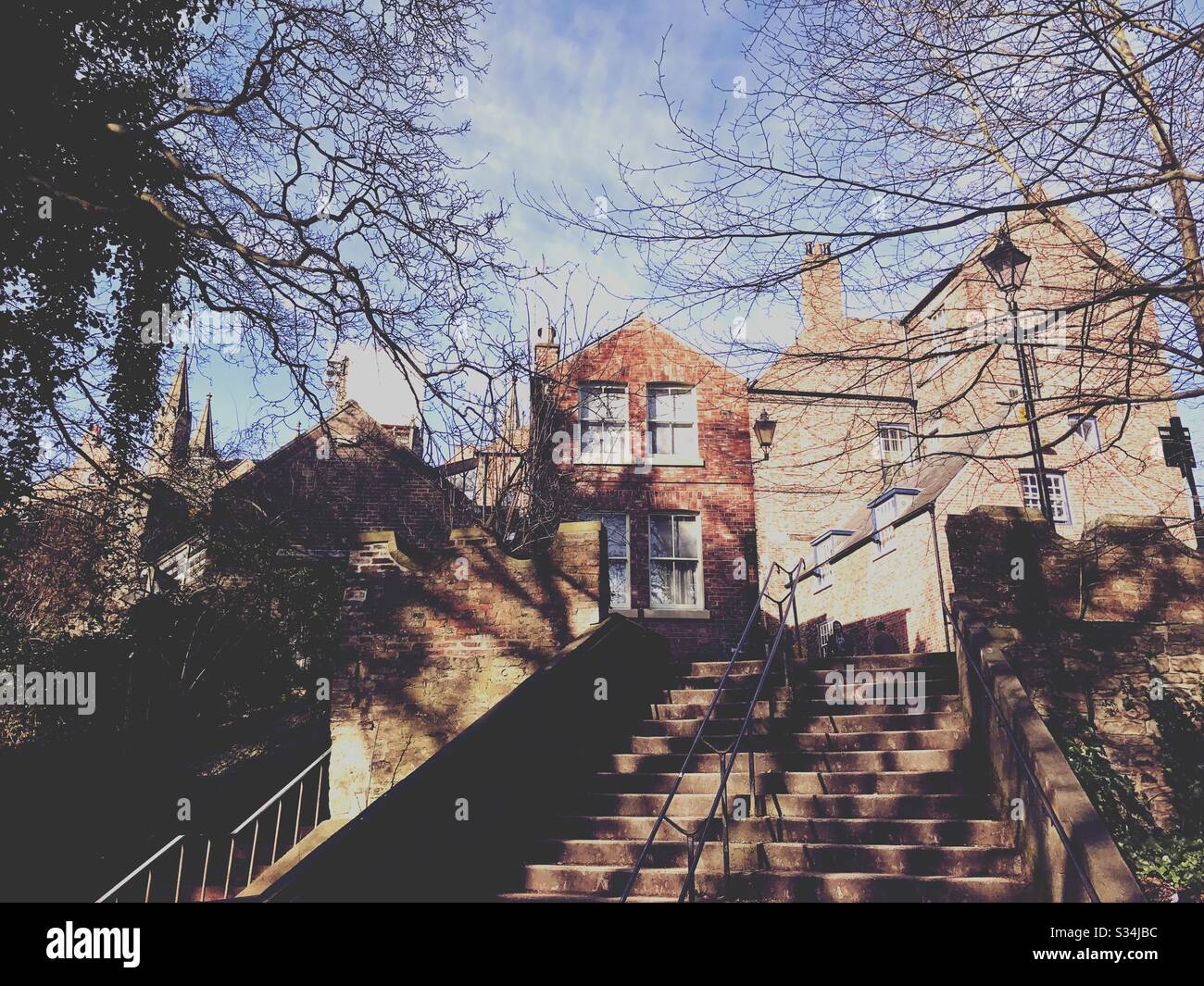 Architecture of Durham City, North East England. Red brick buildings of Bow Lane, seen from Kingsgate Bridge - Smartphone Captured Stock Image