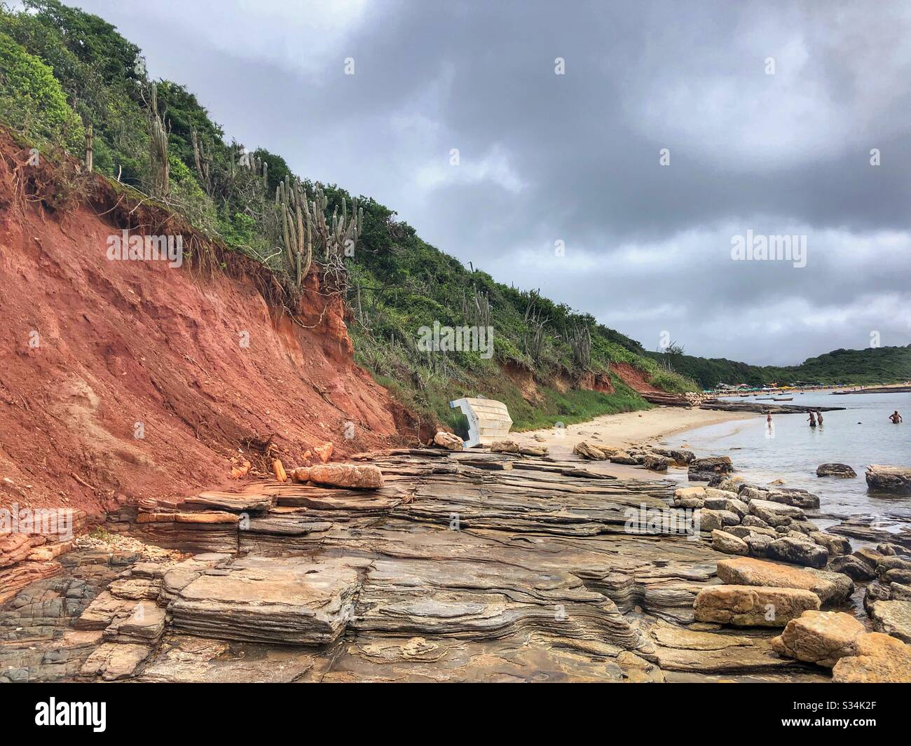 A rocky shoreline at a beach in Buzios, Brazil. Stock Photo