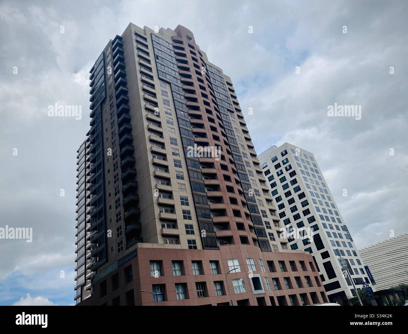LOS ANGELES, CA, MAR 2020: looking up at apartment buildings in Financial District of Downtown on overcast day - Smartphone Captured Stock Image