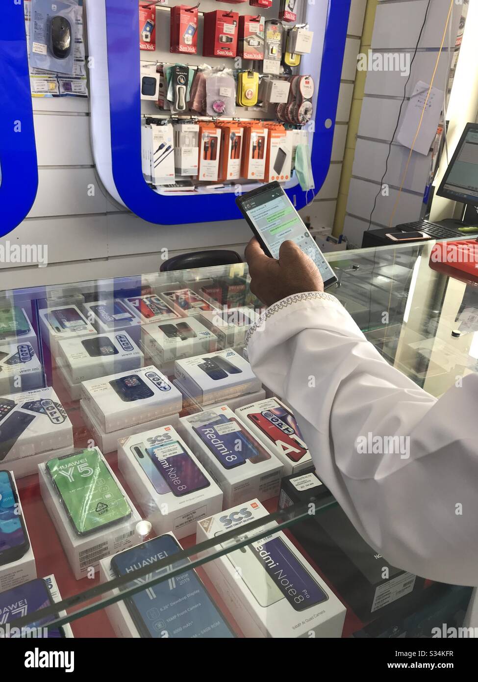 The increase demand for Smart phone: with social distancing required to be observed by everyone the main public communication is the smartphone, the latest the better - Smartphone Captured Stock Image