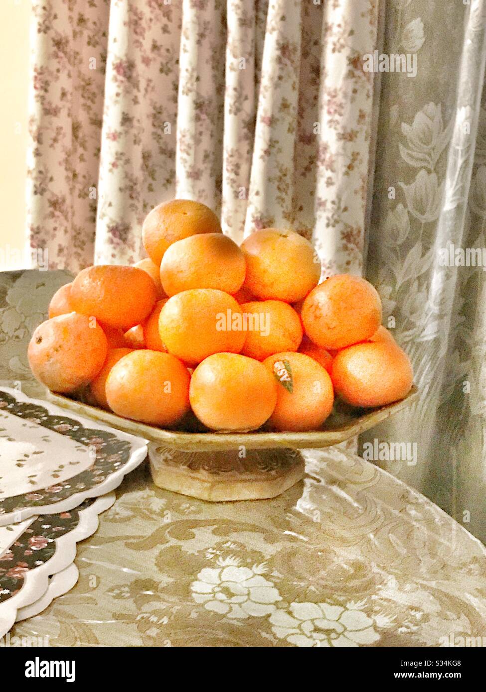 Stocking Seasonal Fruits : Buying extra amount of fruits to face incoming lockdown.This household bought mandarine/oranges to help maintain their diet’s-vitamin C as prevention from Corona infection - Smartphone Captured Stock Image