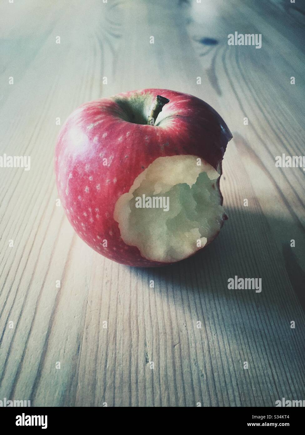 Apple with bite taken Stock Photo Alamy