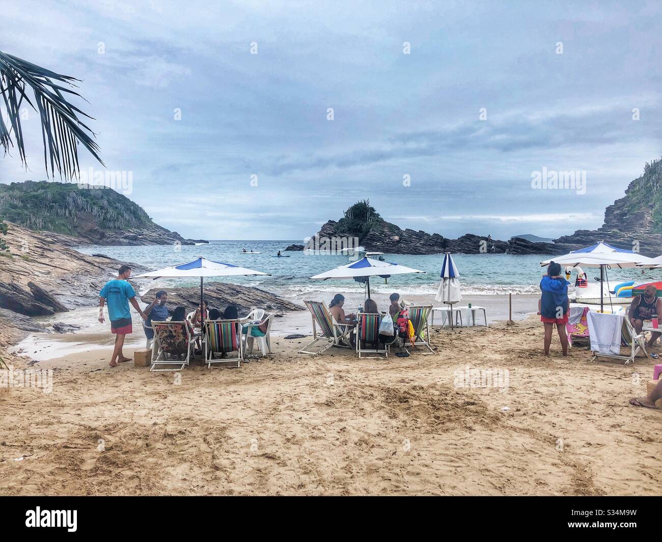 People enjoying their beach holiday in Buzios, Brazil. Stock Photo