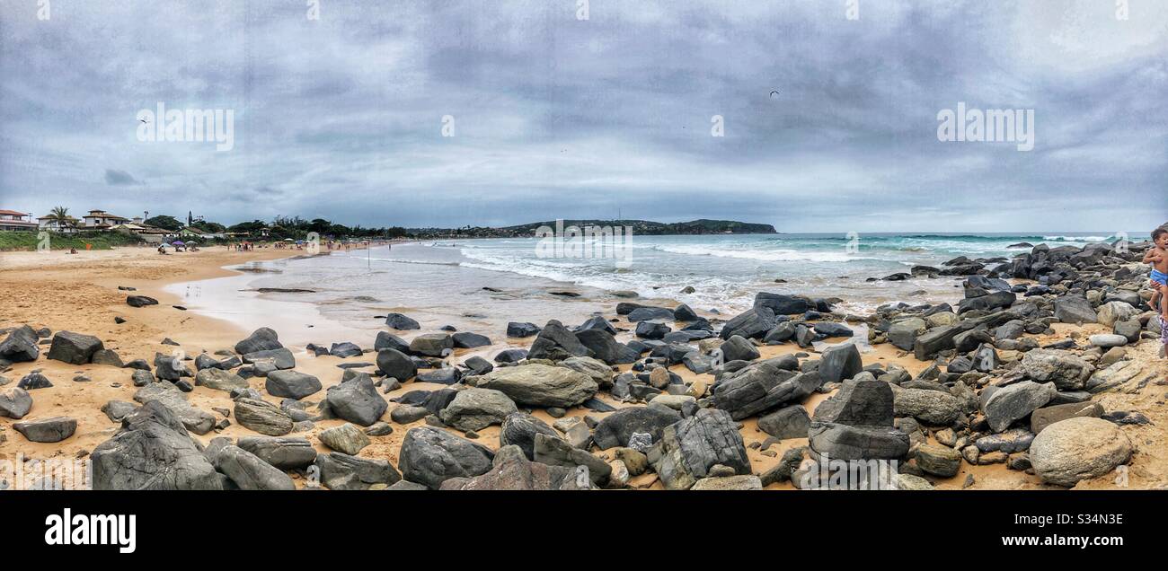A panoramic view of a rocky beach. - Smartphone Captured Stock Image