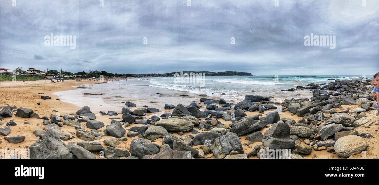 A panoramic view of a rocky beach. Stock Photo