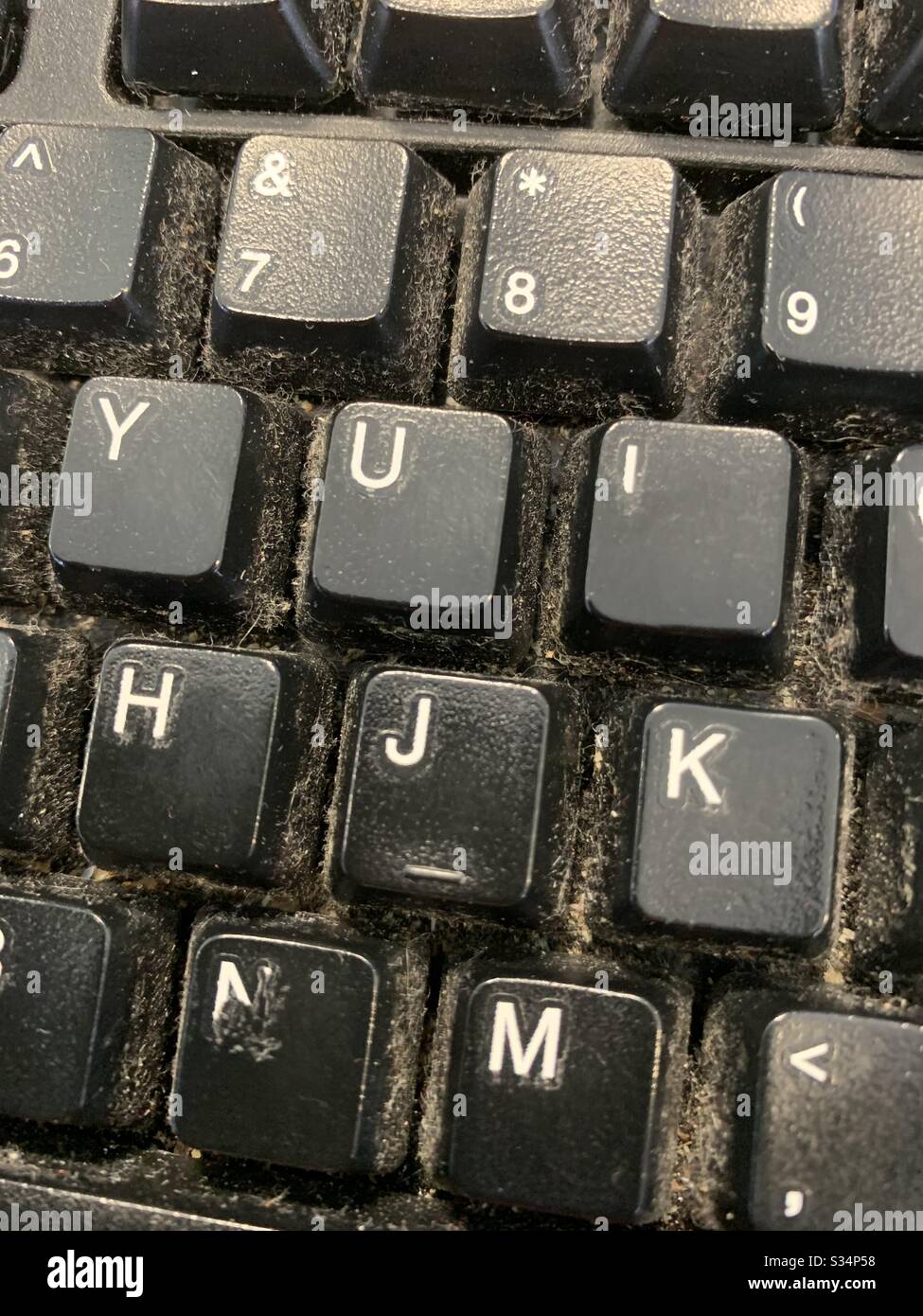Dirty computer keyboard Stock Photo