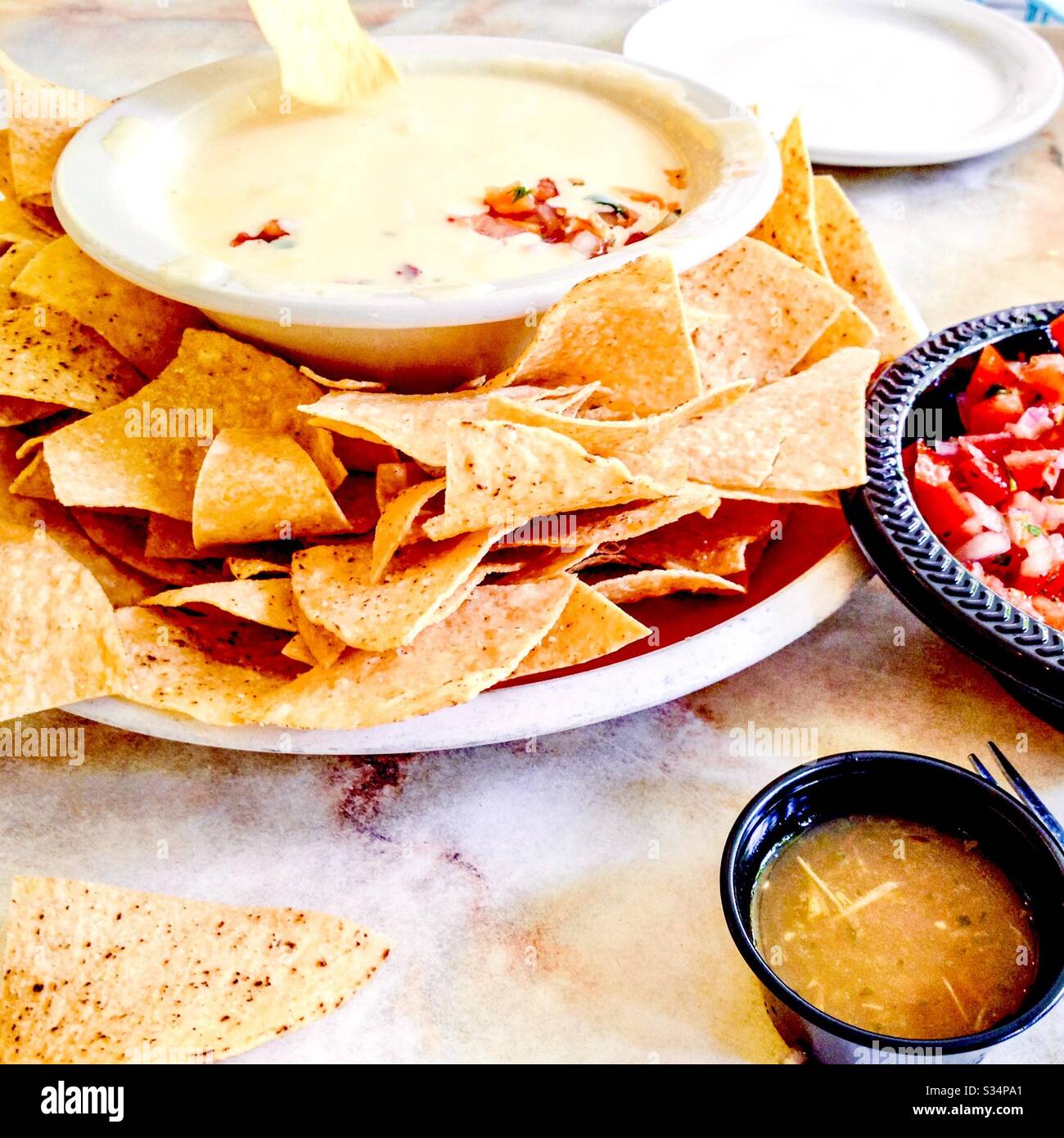 Chips and queso Stock Photo Alamy