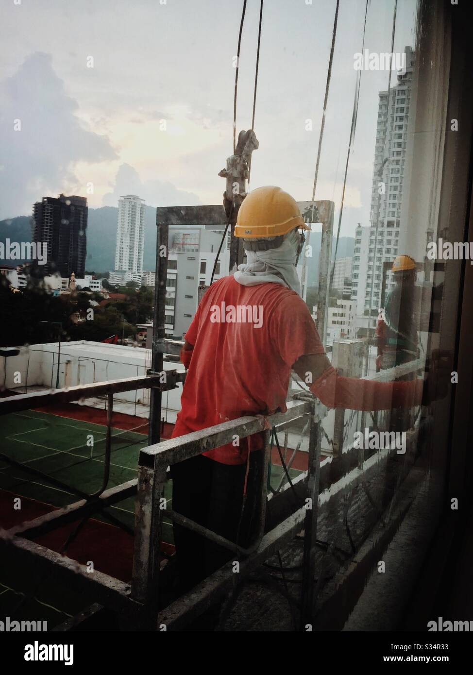 Window cleaners. - Smartphone Captured Stock Image