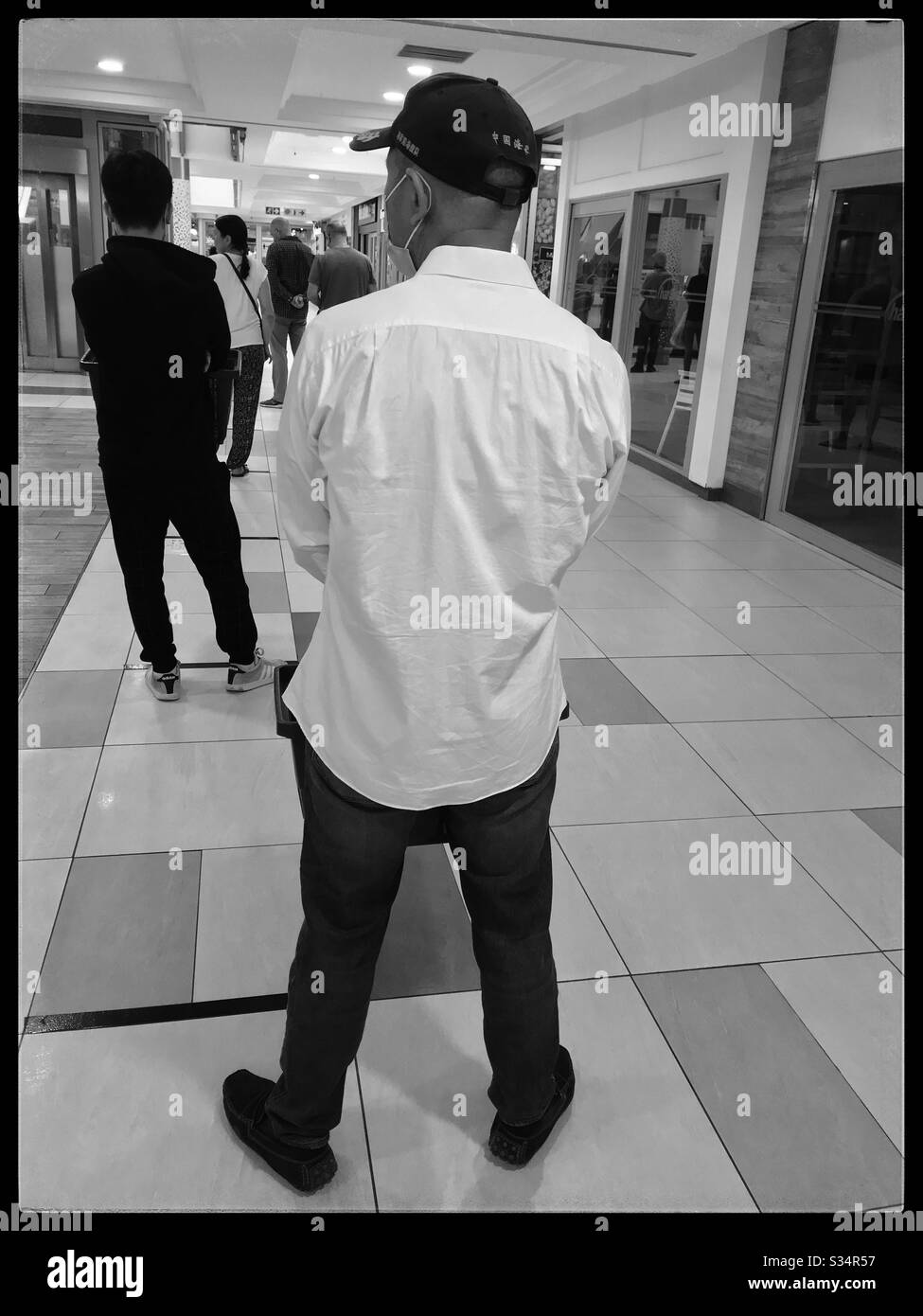 Queueing at safe distance during coronavirus pandemic 2020, Cape Town, South Africa. - Smartphone Captured Stock Image