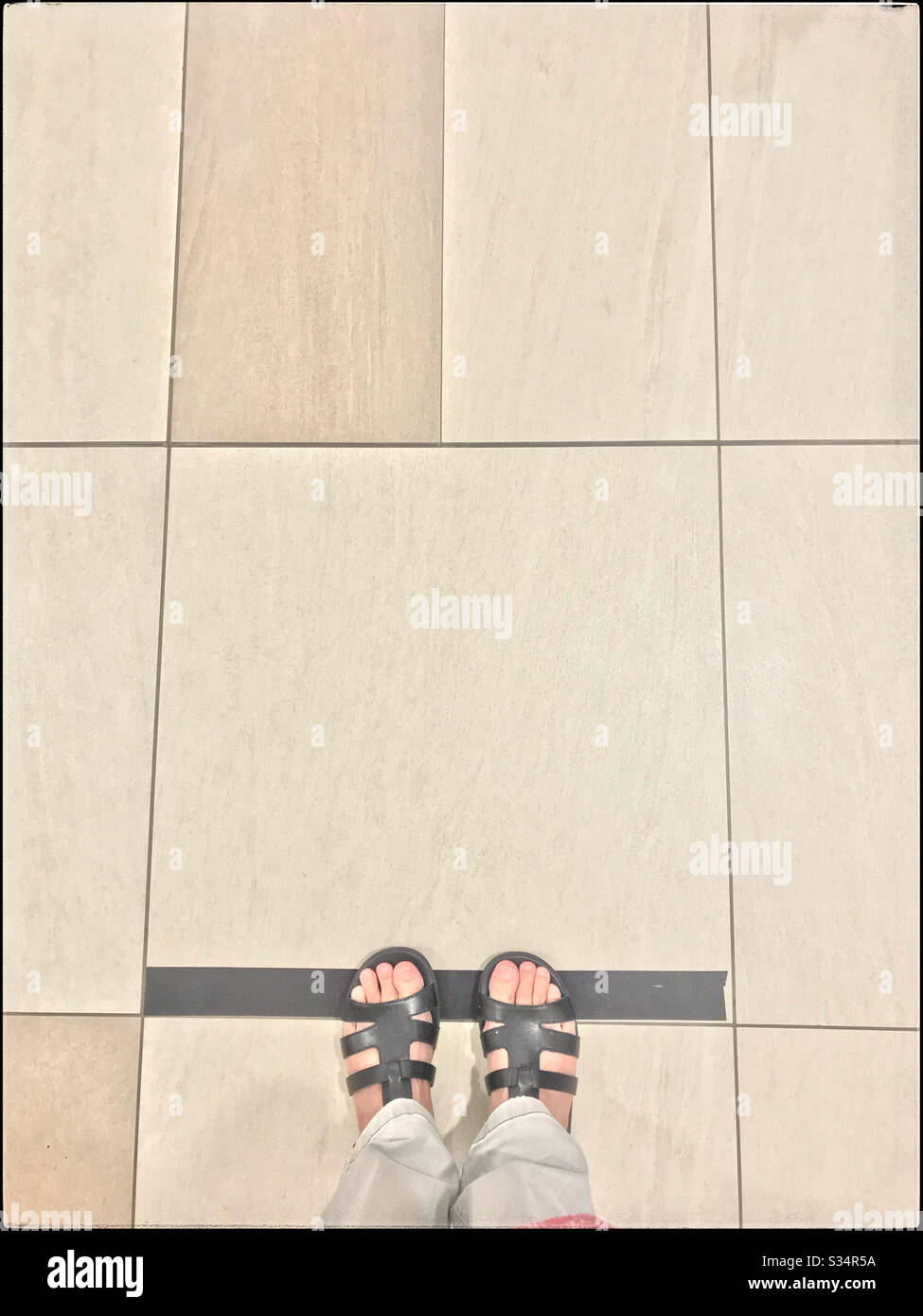 Queueing at safe distance during coronavirus pandemic 2020, Cape Town, South Africa. - Smartphone Captured Stock Image