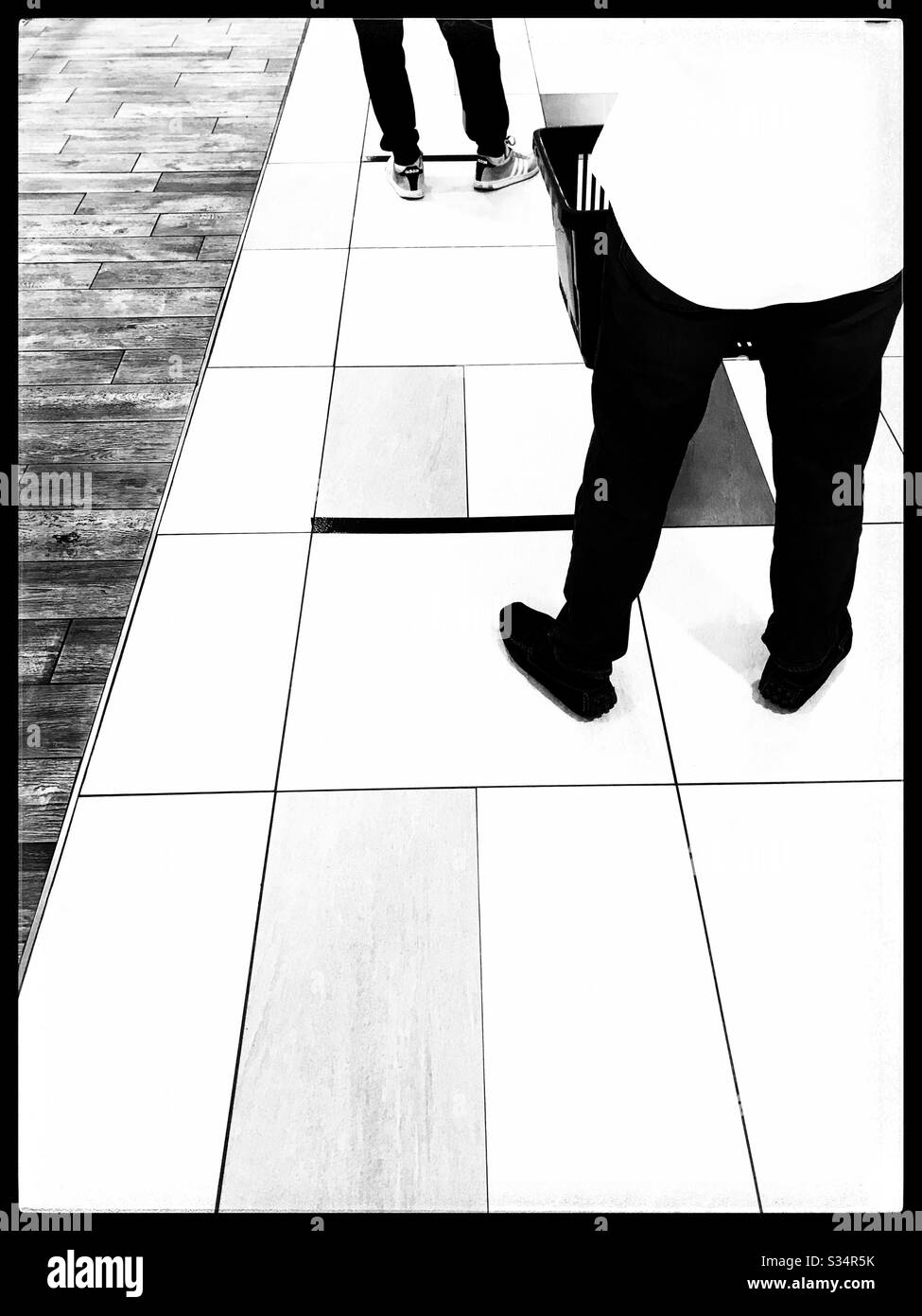 Marked lines for queuing at shops during coronavirus pandemic to ensure social distancing, Cape Town, South Africa. - Smartphone Captured Stock Image