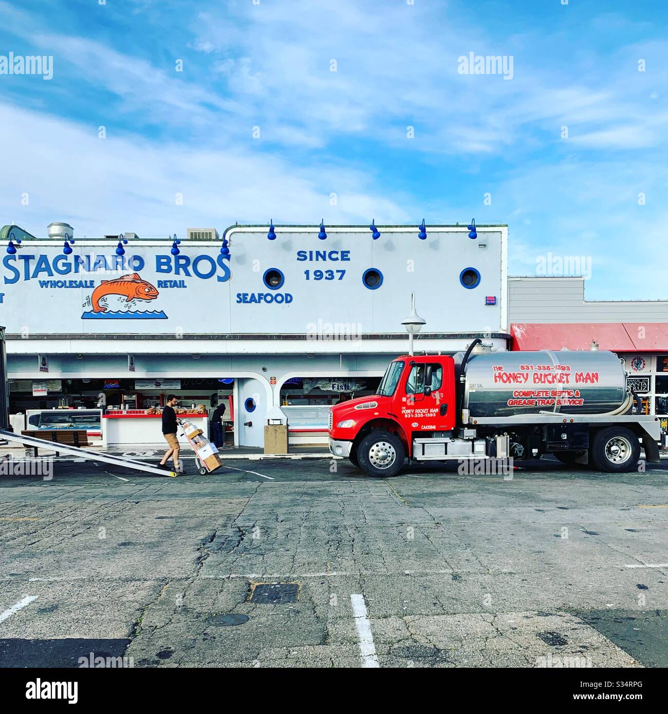 Morning delivery in front of Stagnaro Brothers wholesale and retail seafood, Santa Cruz Wharf, Santa Cruz, California, United States Stock Photo