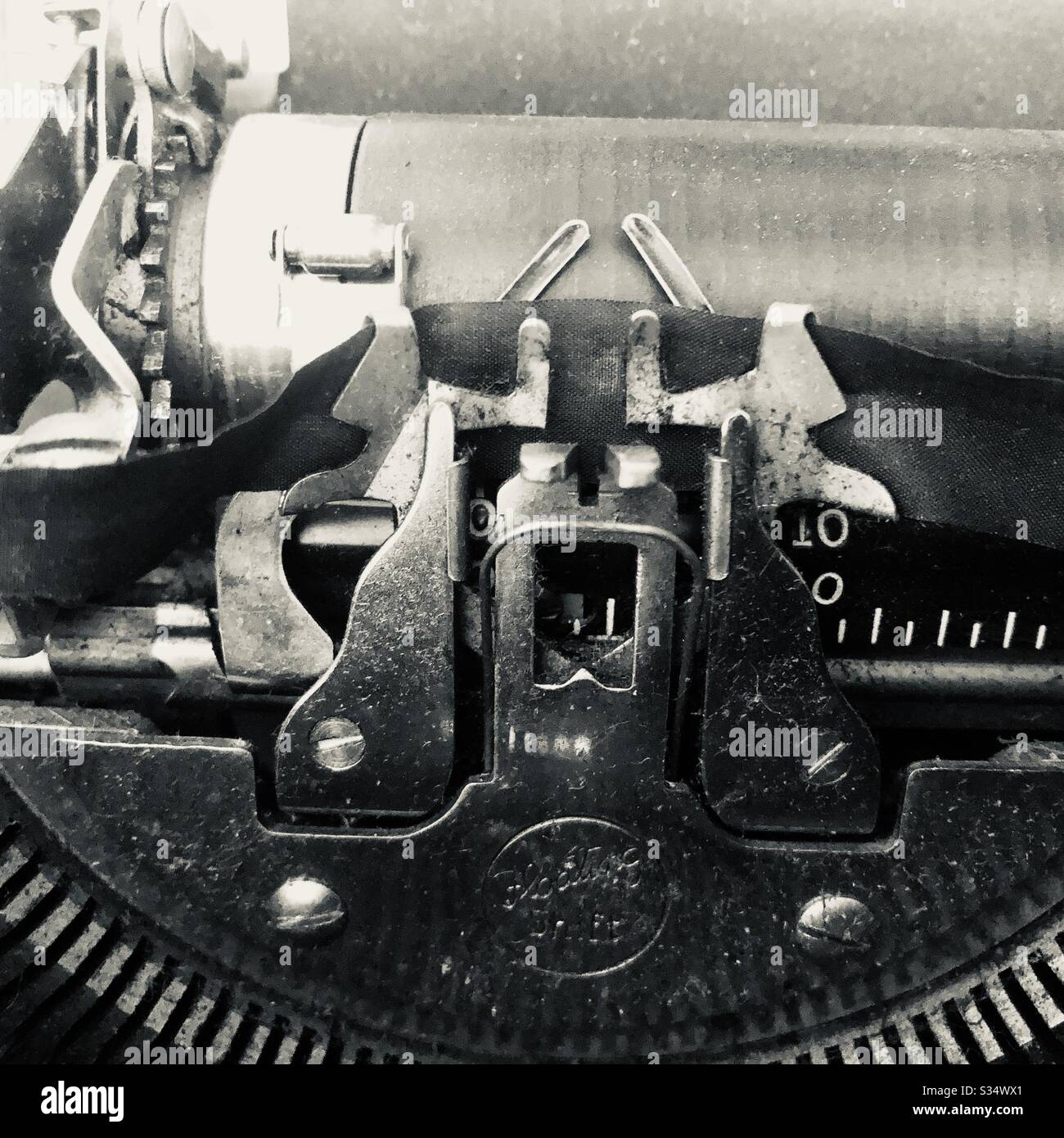 Typewriter Black and White closeup of carriage of 1940’s typewriter
