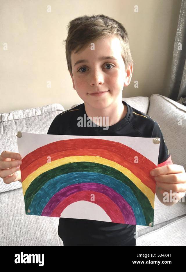 Boy with rainbow picture Stock Photo Alamy