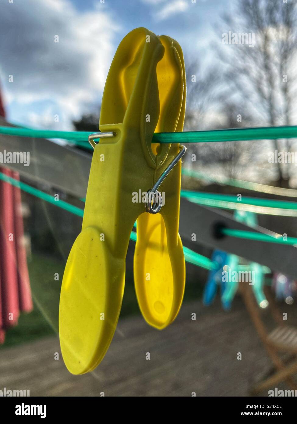Clothes pegs on a washing line Stock Photo Alamy