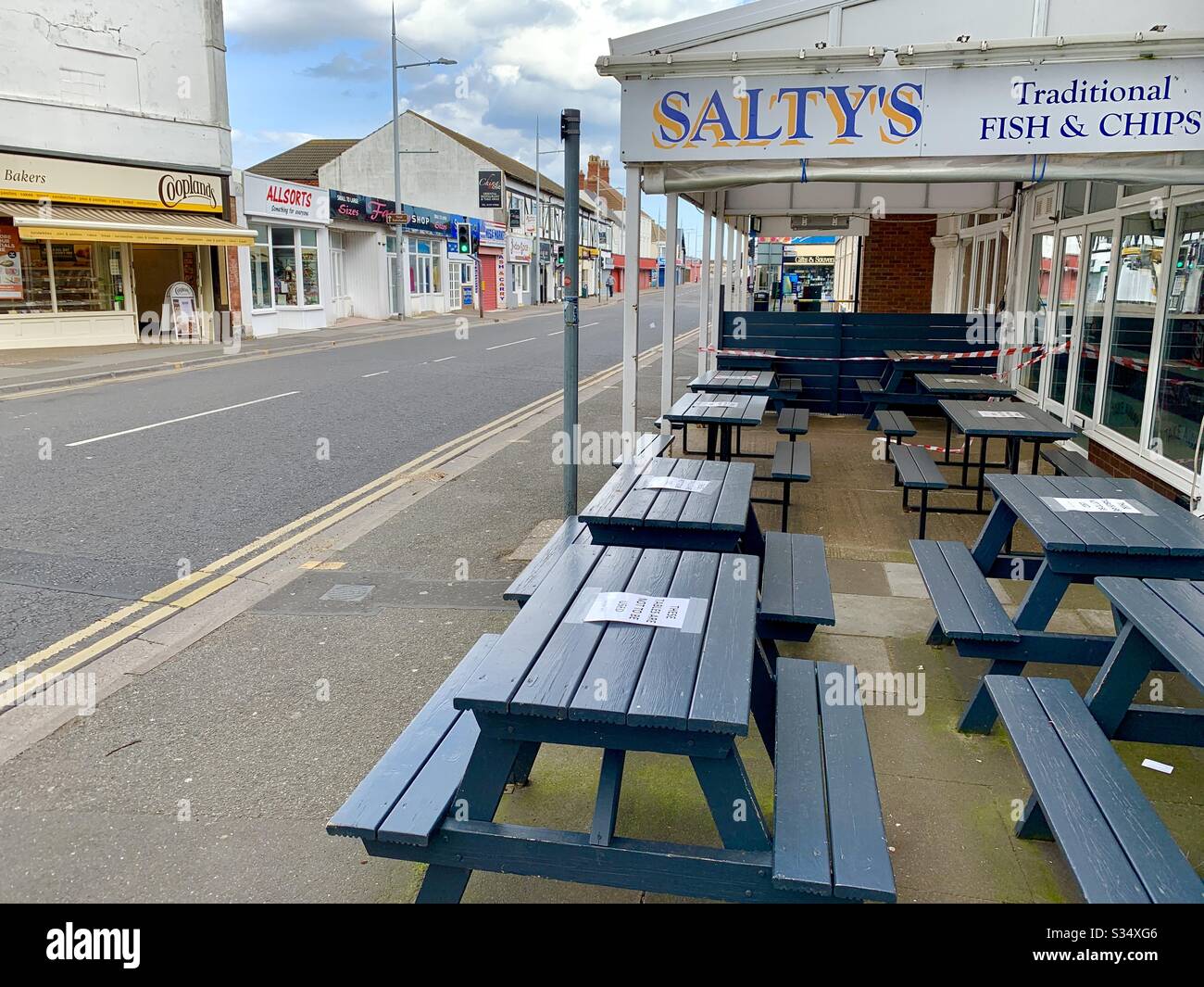 The deserted coastal town of Mablethorpe with an empty high street and closed shops during the Coronavirus Covid19 lockdown Stock Photo