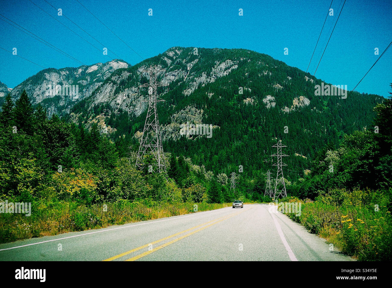 View of Cascade Mountain Range in Washington along Road Stock Photo