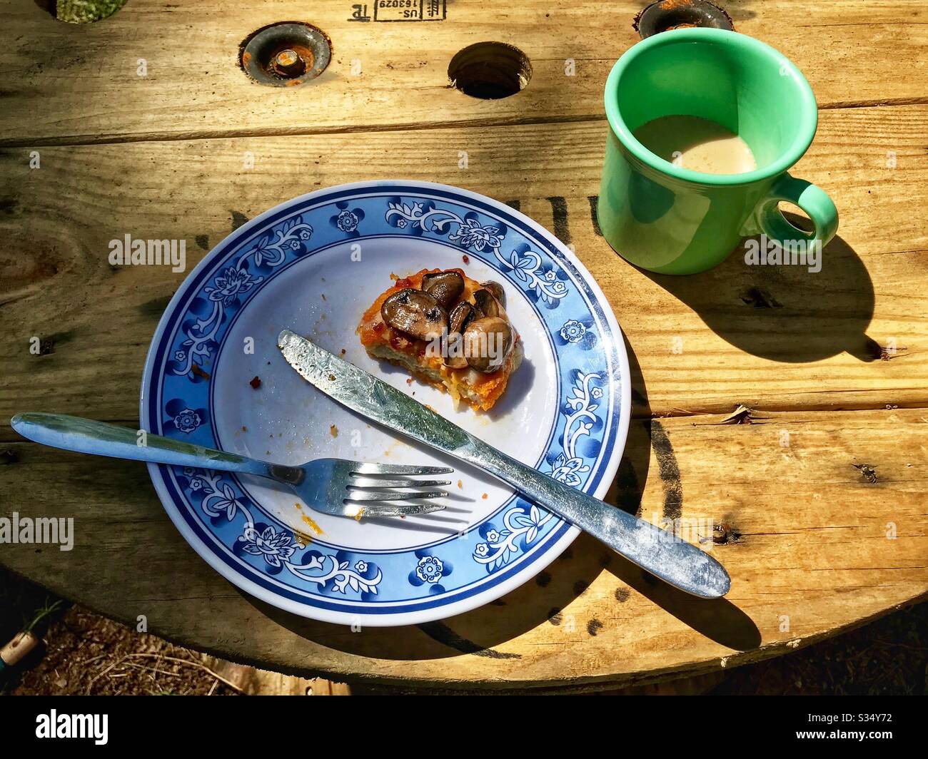 Brunch alone outside during Covid-19 lockdown in North Carolina on a sunny spring day - Smartphone Captured Stock Image