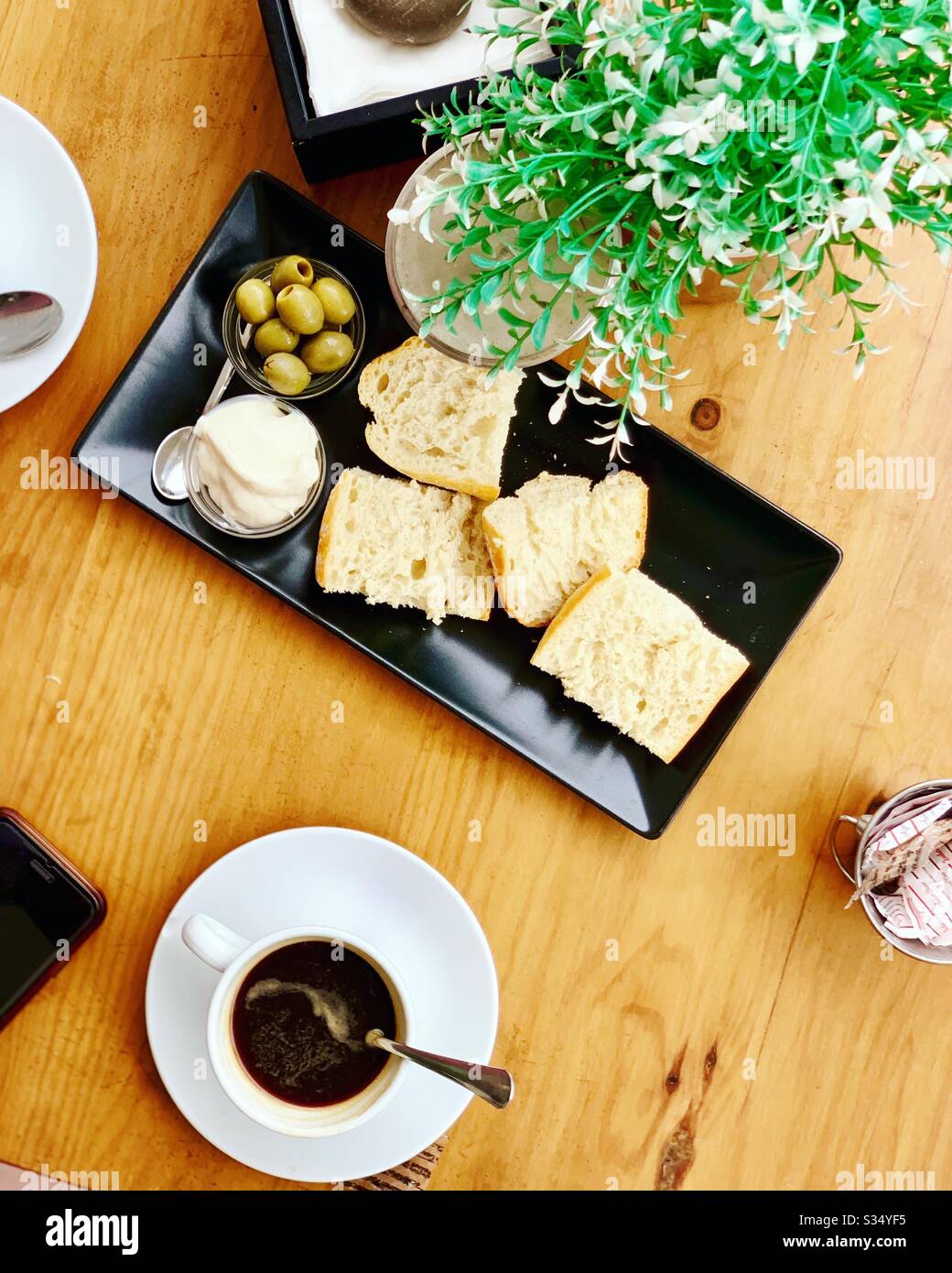 Coffee bread and olives Stock Photo Alamy