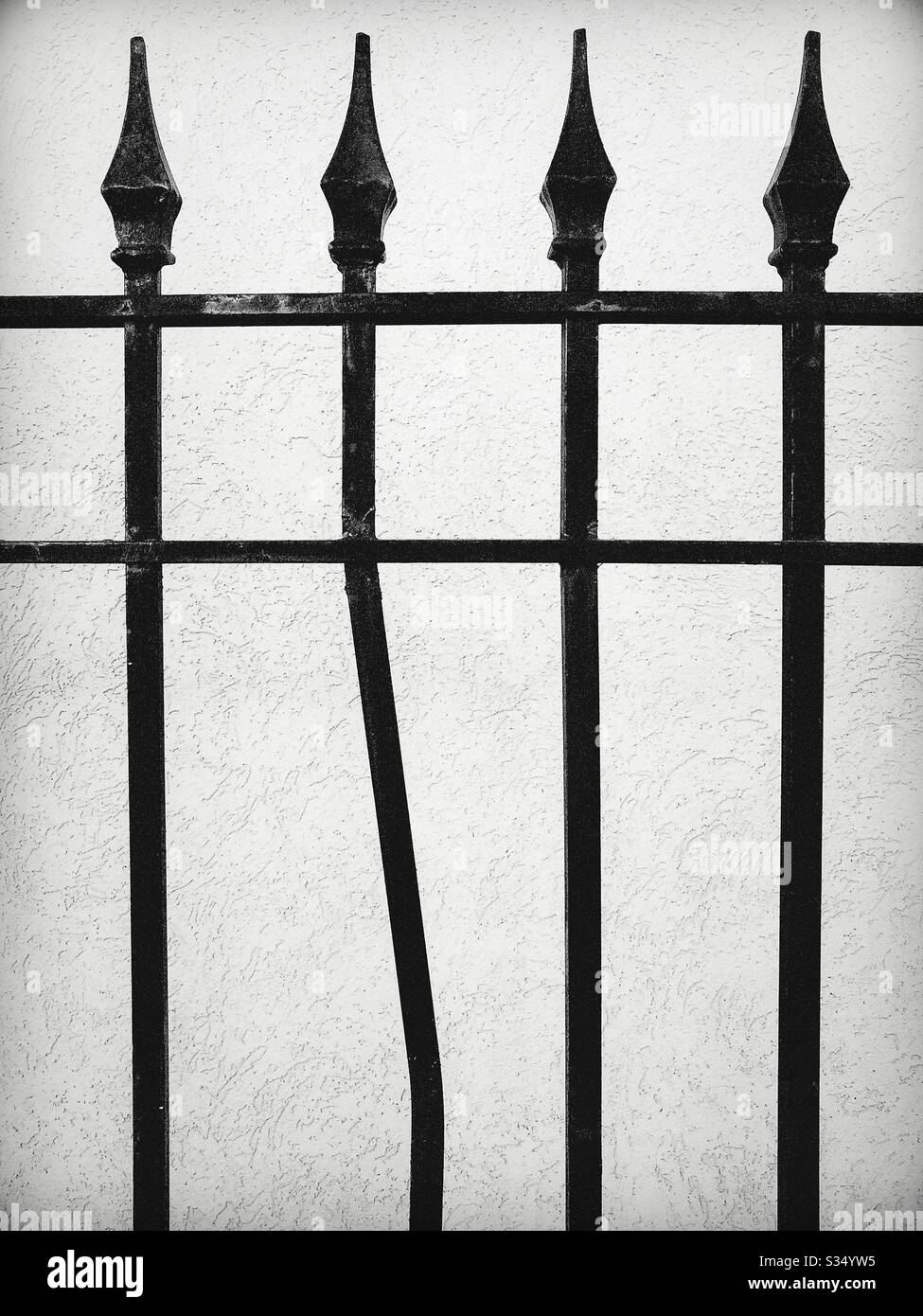 Bent Iron Fence Post Stock Photo